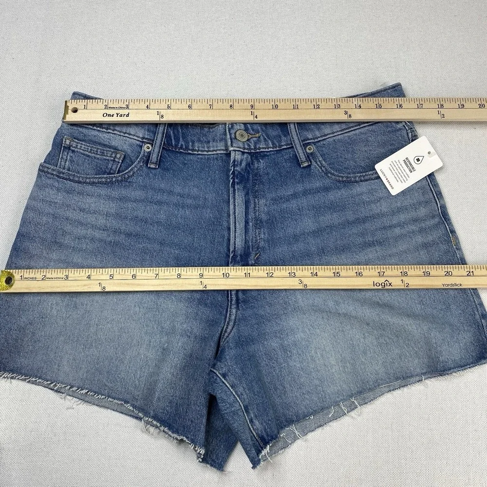 Lucky Brand Women's Sz 12/31 90s‎ Midi Shorts High Rise Raw Hem Medium Wash